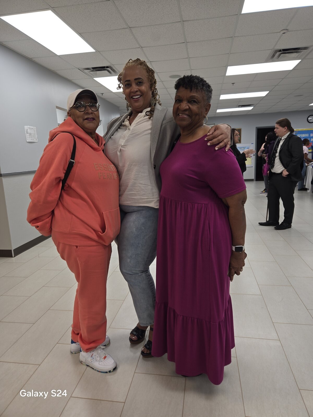 Gloria Joyner with residents at a community gathering