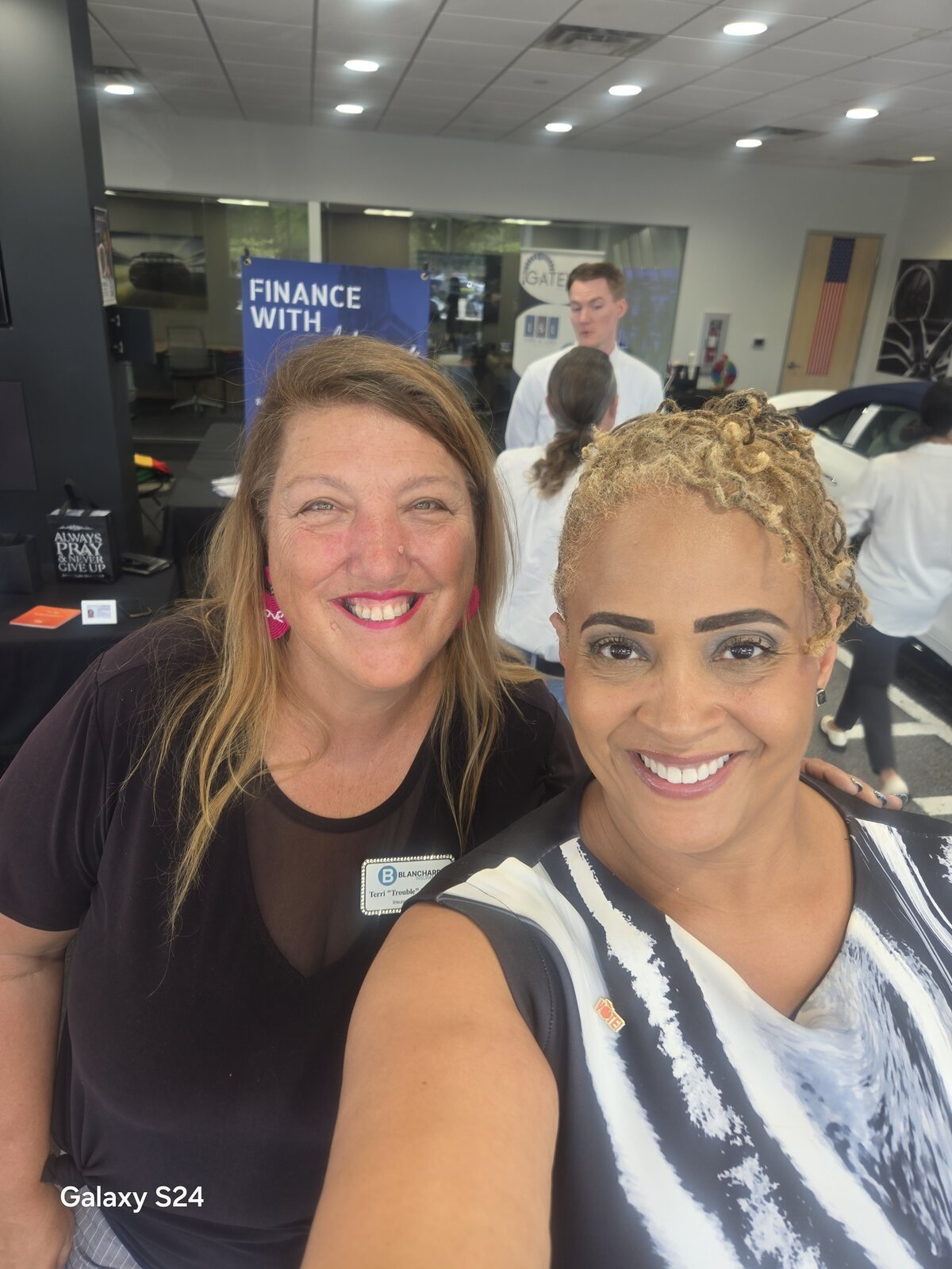 Gloria Joyner meeting an attendee at a local community event