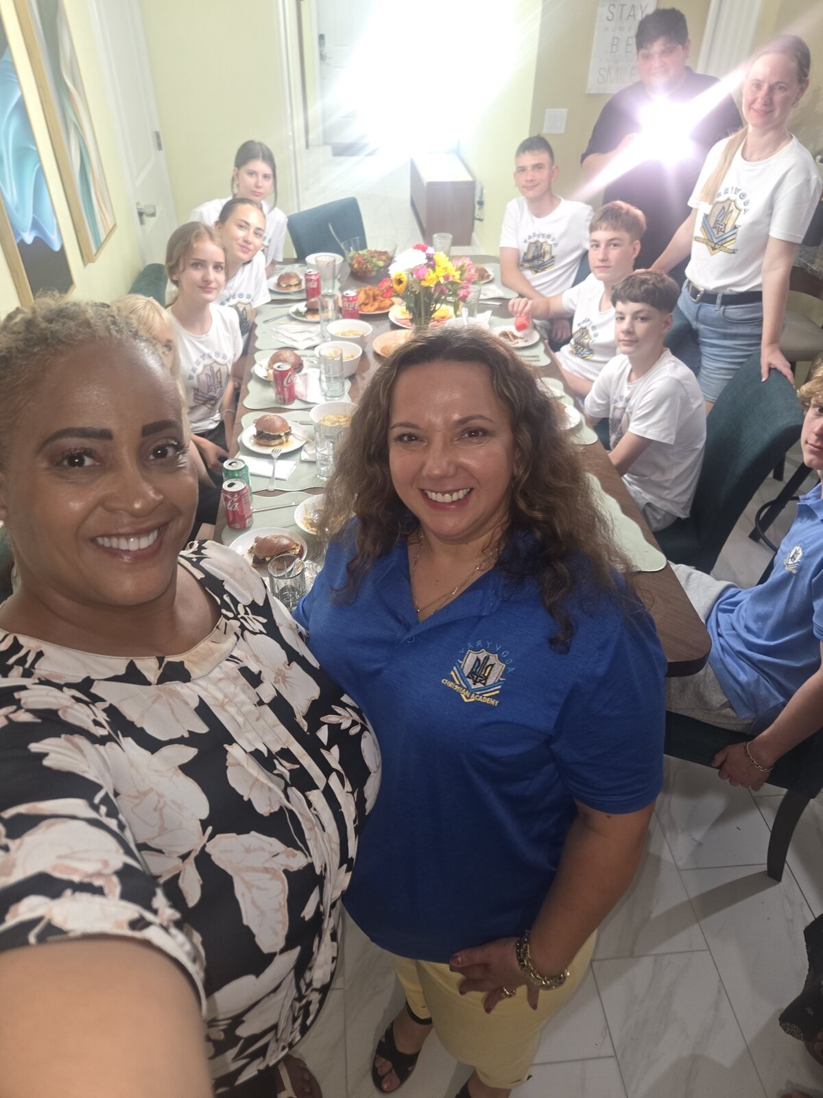 Gloria Joyner with a community leader during a local gathering