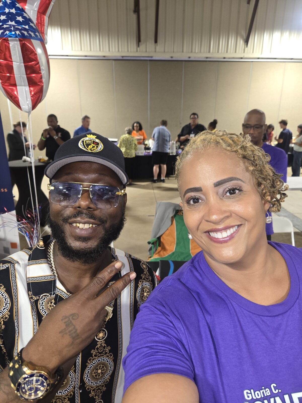 Gloria Joyner with a supporter at a community event