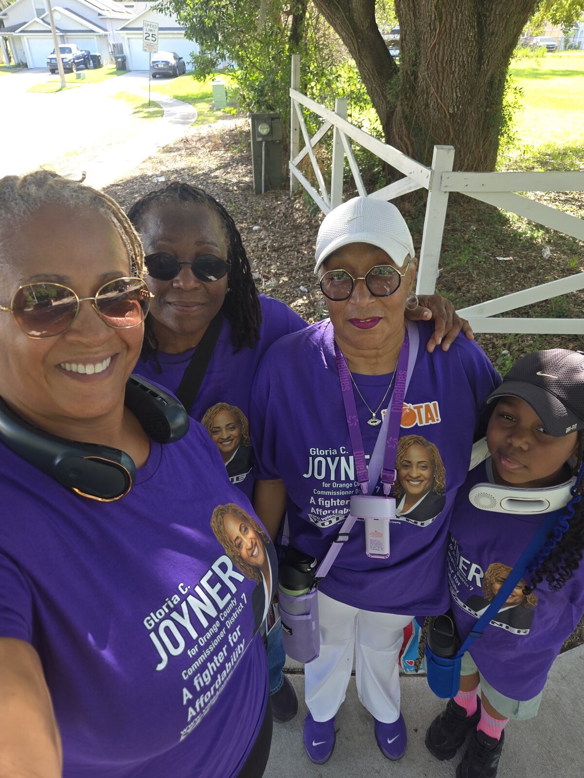 Gloria Joyner with campaign volunteers outdoors