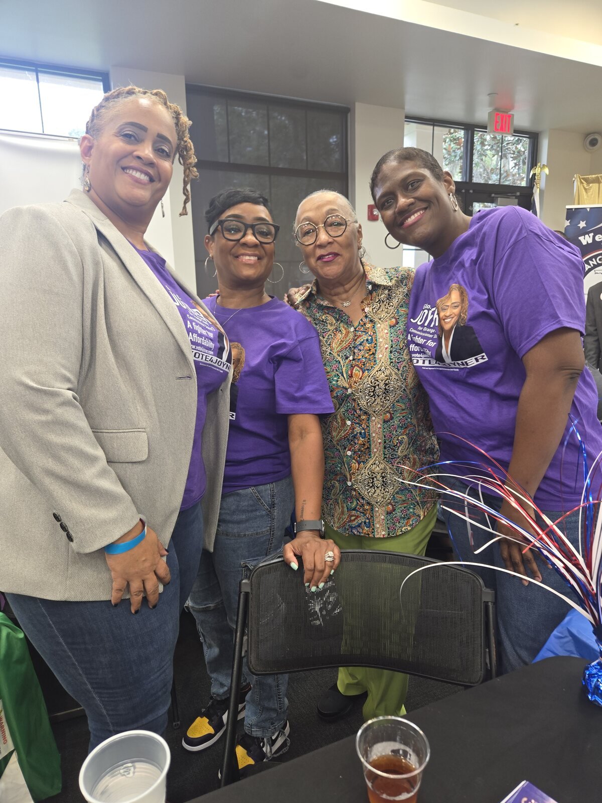 Gloria Joyner with campaign supporters at a community event
